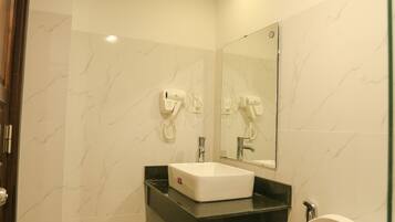 Rainfall showerhead, free toiletries, hair dryer, slippers