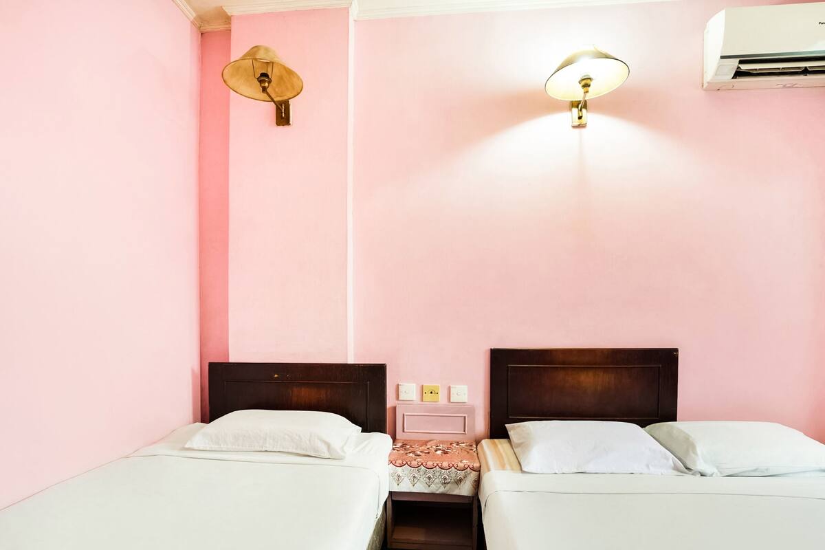 Deluxe Triple Room | Iron/ironing board, free WiFi, bed sheets