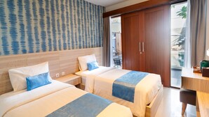 Deluxe Twin Room | Desk, WiFi (free), bed sheets - Mahesa Suites Seminyak (Seminyak)