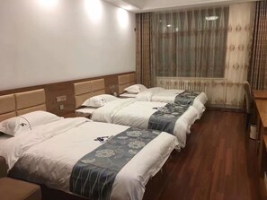 Habitación triple Deluxe | Wifi gratis 