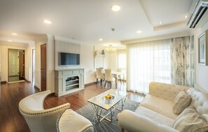 32-inch flat-screen TV with satellite channels, TV