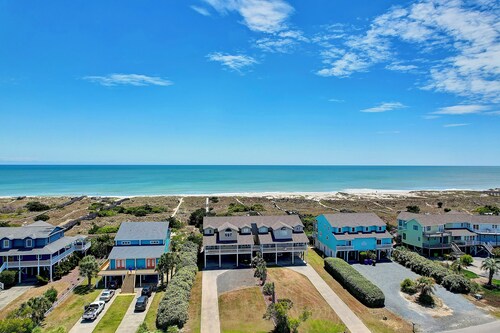 Oceanfront "Boardwalk" is a 6 Bdrm/5.5 Bath in the private, gated west end of Holden Beach. 