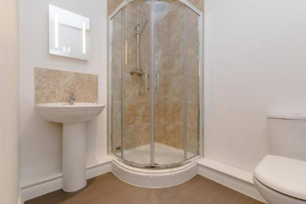 Separate tub and shower, free toiletries, slippers, towels