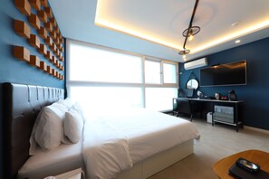 Quartos à prova de som, Wi-Fi de cortesia, roupa de cama