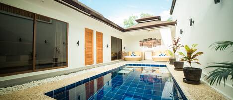 Indoor pool, sun loungers