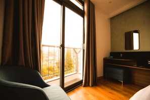 Minibar, bureau, rideaux occultants, chambres insonorisées