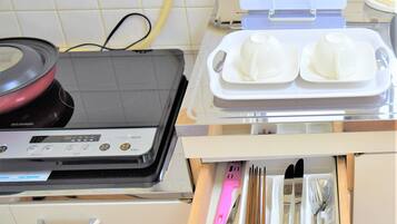 Apartment | Private kitchenette | Fridge, microwave, stovetop, cookware/dishes/utensils