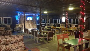 Breakfast, lunch, dinner served; local cuisine 