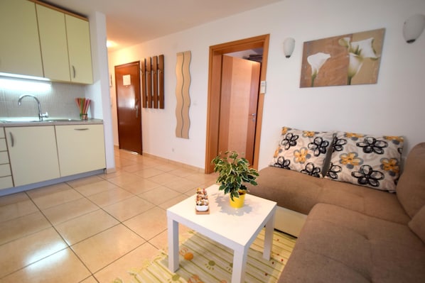 Apartment, 2 Bedrooms | Living area | Flat-screen TV