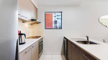 City Apartment, 2 Bedrooms | Private kitchen | Full-sized fridge, microwave, oven, stovetop