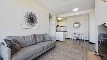 Comfort Apartment, 2 Bedrooms | Living room | 40-inch Smart TV with satellite channels, TV, Netflix