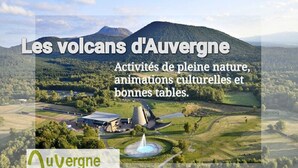 Vista panorámica de Auvergne, con montañas, una fuente y un edificio que indica 'Destination Volcans'.