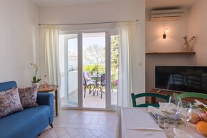 Apartment, 2 Bedrooms (750 - Ivona) | Living room | Flat-screen TV - Apartments Ivona (Malinska-Dubasnica)