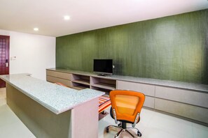 Suite, 1 Bedroom | Living area | 32-inch flat-screen TV with cable channels, TV