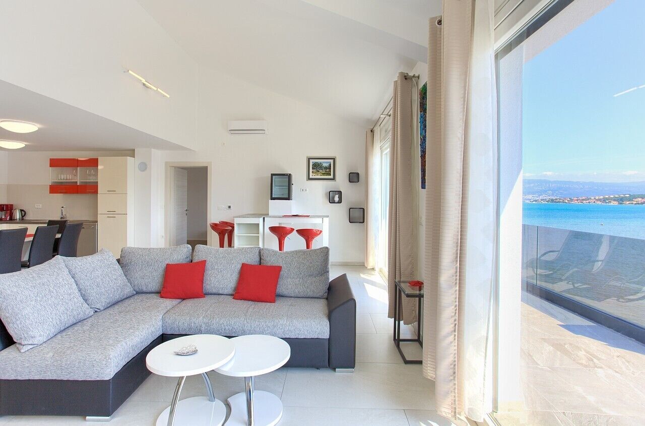 Apartment, 4 Bedrooms | Living area | Flat-screen TV