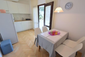 Apartment, 1 Bedroom (62 - lijevi, veci) | Living area | Flat-screen TV - Apartments Ivka-Rozalija near Beach (Malinska-Dubasnica)