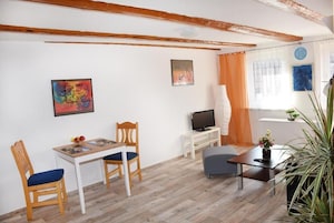 Standard Condo (Apartment 5) | Living room | 24-inch flat-screen TV with satellite channels, LED TV