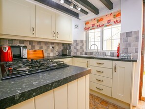 Cottage | Private kitchen | Fridge, microwave, stovetop, high chair - Japonica Cottage (Cheltenham)