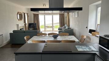 Cottage | Private kitchen | Stovetop, dishwasher, highchair, cookware/dishes/utensils