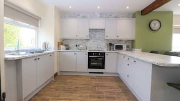 Cottage | Cucina privata | Frigorifero, pentole/stoviglie/utensili