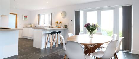 Cottage | Private kitchen | Stovetop, dishwasher, highchair, cookware/dishes/utensils