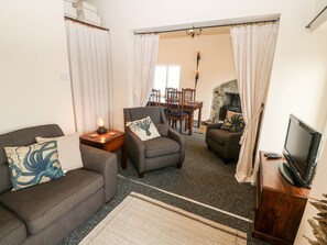 Cottage | Living room | TV - Beacon Cottage (Cemaes Bay)