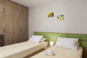 Apartment, 3 Bedrooms | 3 bedrooms, in-room safe, laptop workspace, iron/ironing board - Bright Modern Flat next to Beach (Platanias)