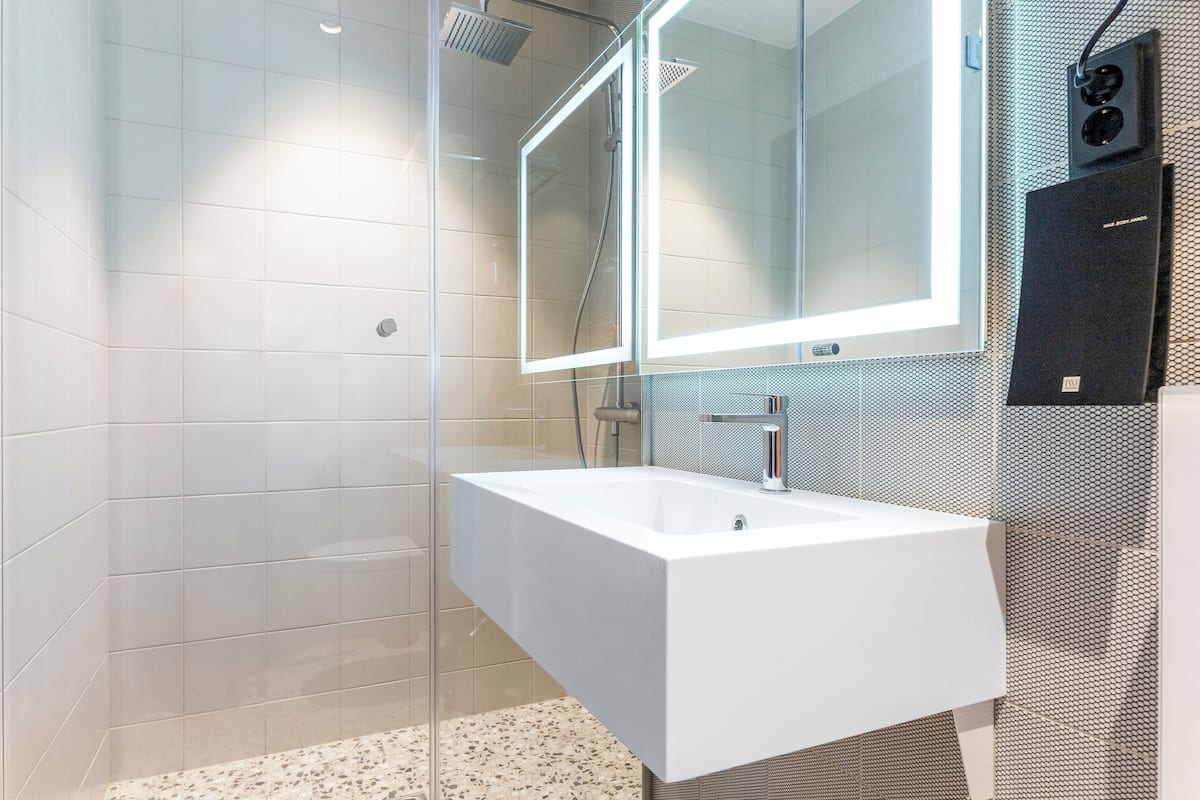 double room (small atrium) | bathroom | shower, hair dryer, heated floors, towels