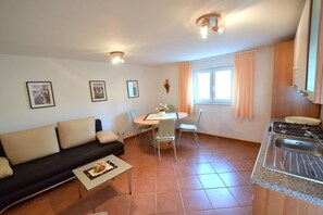 Apartment, 1 Bedroom, Terrace (308 – konoba) | Living area | TV - Apartments Markovic (Dobrinj)