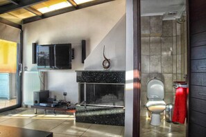 Apartment, 3 Bedrooms (Two Floors) | Living room | Flat-screen TV, fireplace - City & Sea Two Floor Flat with View Next to Metro (Elliniko-Argyroupoli)