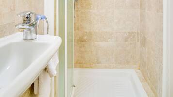 Luxury Apartment | Bathroom | Separate tub and shower, rainfall showerhead, free toiletries