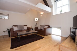 City Apartment, 2 Bedrooms | Living room | Flat-screen TV, DVD player