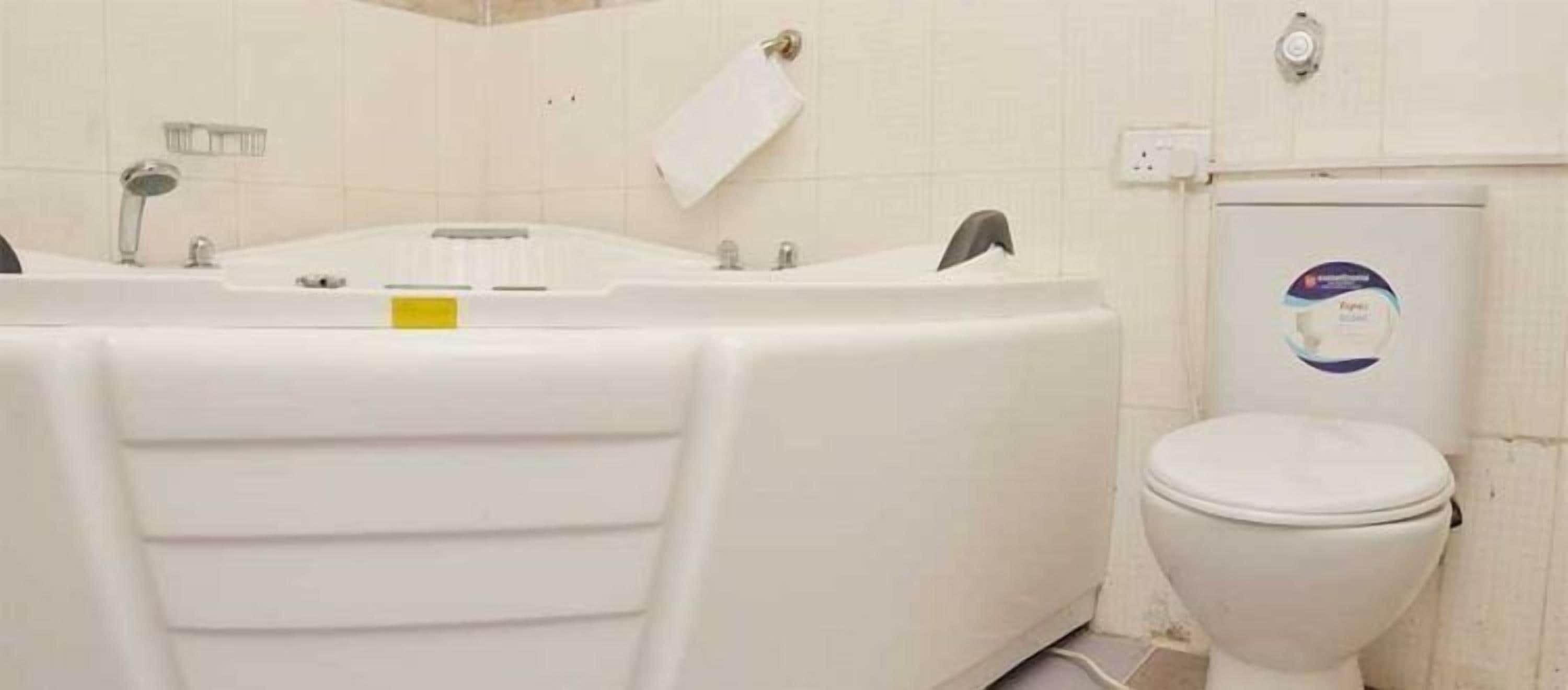 Douche, articles de toilette gratuits, serviettes fournies