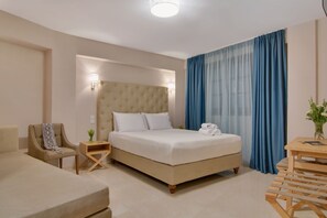 Habitación triple Deluxe | Sábanas de algodón egipcio y ropa de cama de alta calidad