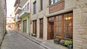 A stone building with a sign for 'Alfa Pasha Hotel'. - Ali Pasha Hotel (Ioannina)