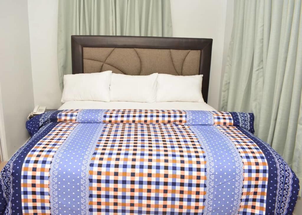 Desk, laptop workspace, free WiFi, bed sheets