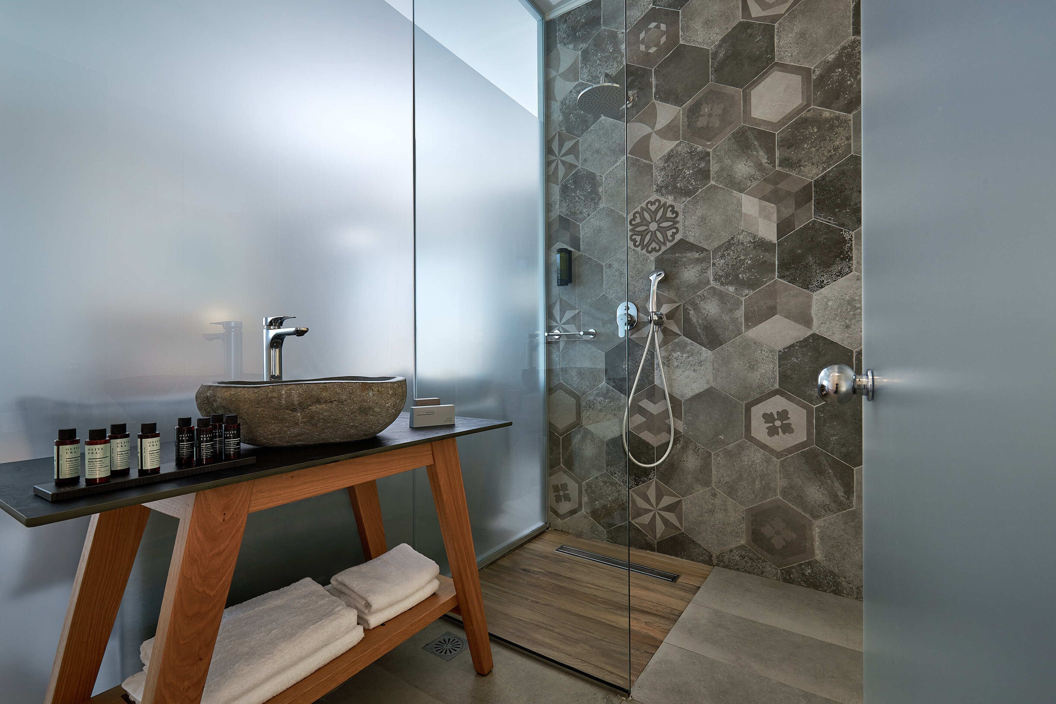 junior suite, private pool | bathroom | free toiletries, hair dryer, slippers, towels