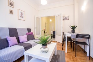 Apartment, 1 Bedroom | Living room | Smart TV