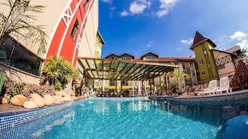 Indoor pool, outdoor pool, pool umbrellas, sun loungers