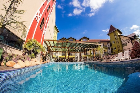 Indoor pool, outdoor pool, pool umbrellas, sun loungers