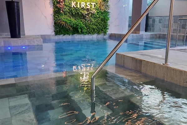 Indoor pool, outdoor pool, pool umbrellas, sun loungers