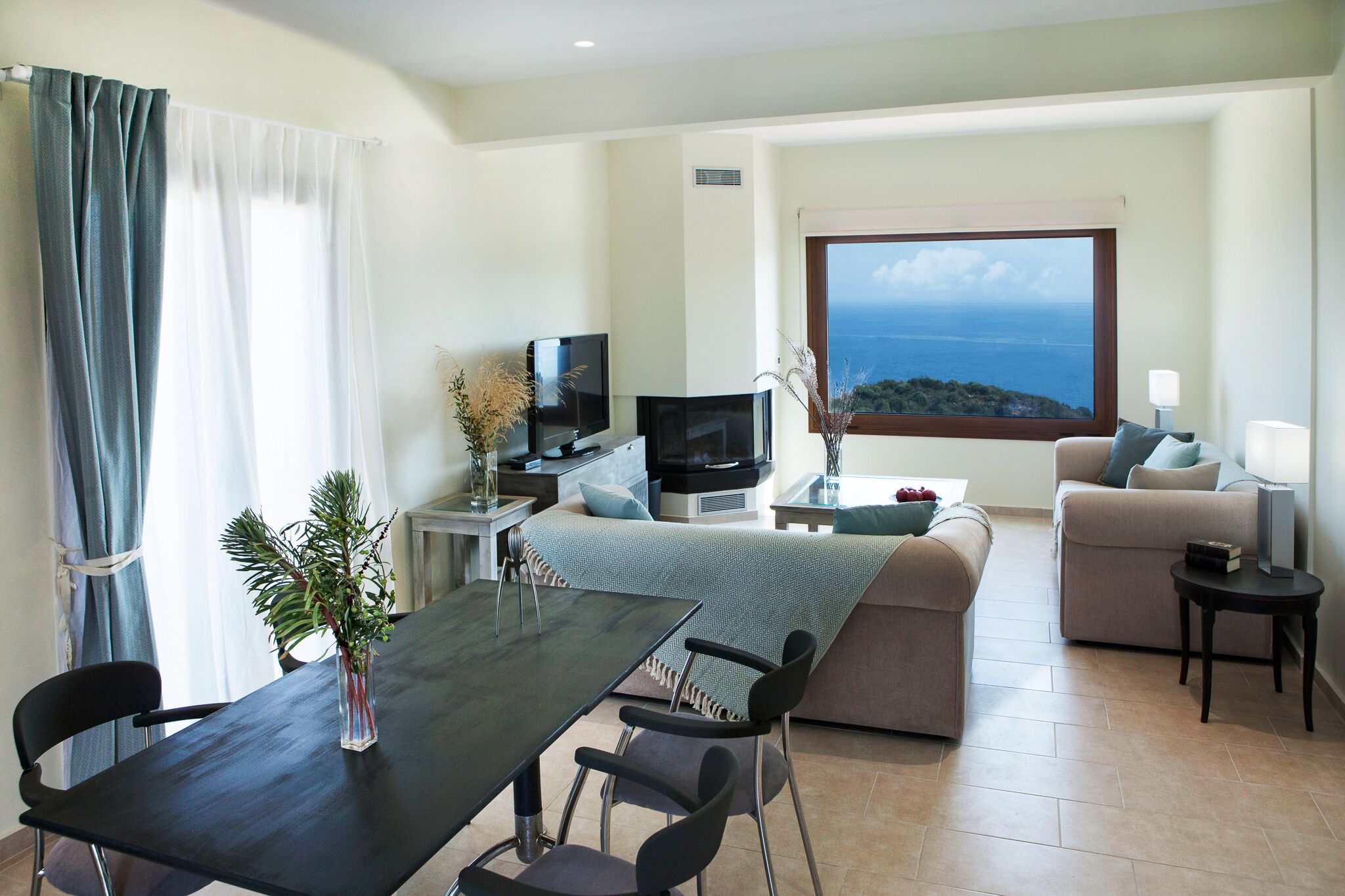Apartment | Living area | Flat-screen TV, fireplace, video game console