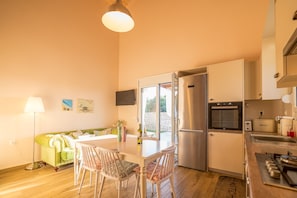 Casa, 2 quartos | Cozinha privada | Geladeira, fogão, cooktop, lava-louças