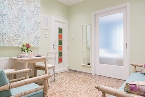 Apartment, 1 Bedroom | Living room | Flat-screen TV