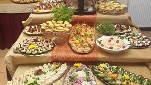 A buffet table with various food items and a coffee station. - Zającówka (Szklarska Poreba)