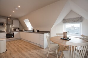 Apartment, 2 Bedrooms | Private kitchen | Mini-fridge, microwave, oven, stovetop