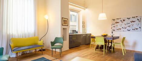 Deluxe Apartment, 3 Bedrooms | Living area | Flat-screen TV