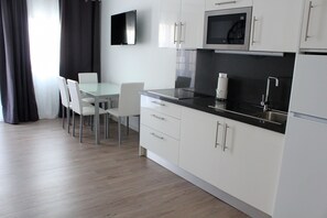 Fridge, microwave, coffee/tea maker, electric kettle
