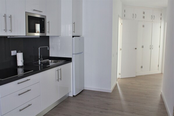 Fridge, microwave, coffee/tea maker, electric kettle