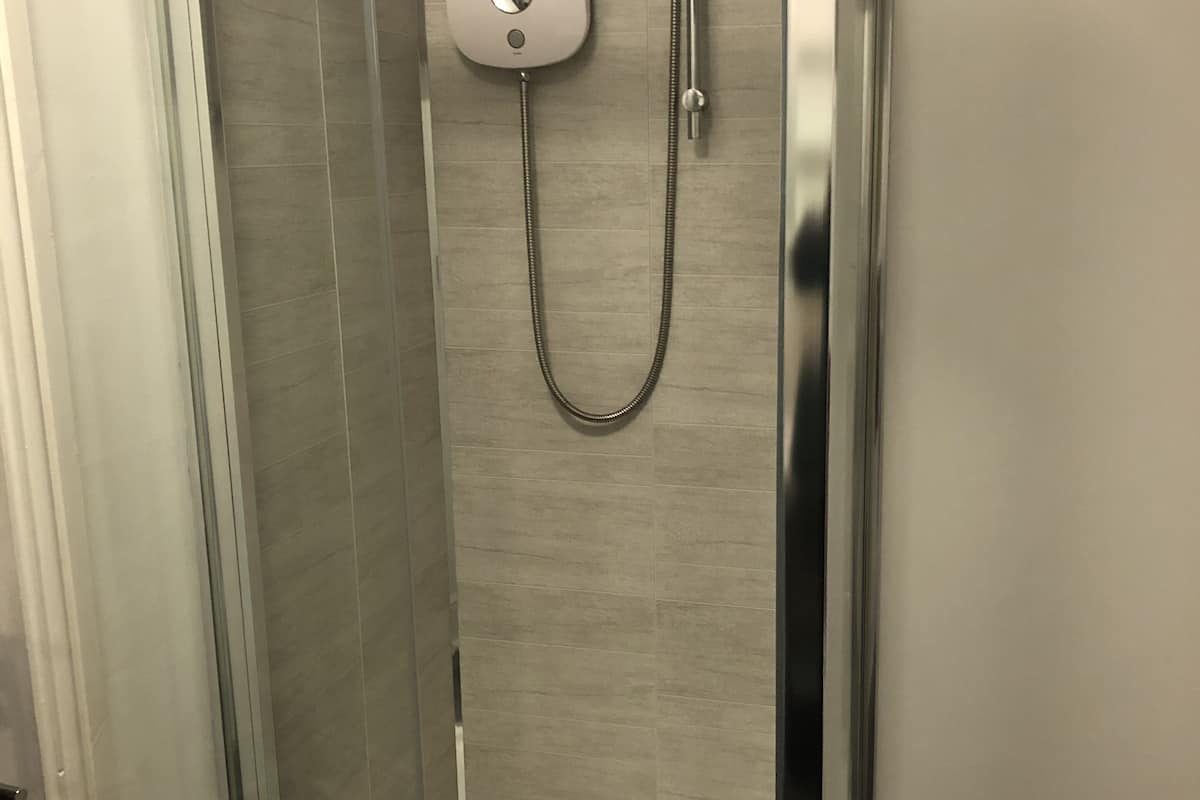 double room (large single bed) | bathroom shower